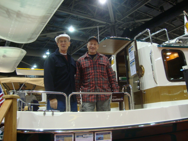Joe (R-MATEY) 
& Jon (C-LOU)...
This could be Jon's next boat but Cynthia doesn't know it yet...LOL