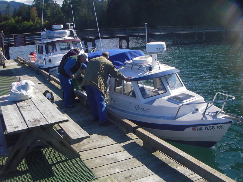 Looking over the "Stretch 16" C-Voyager at SBSP dock,) Sequim Bay CBGT-07.  Dreamer, a TomCat 255 just aft.