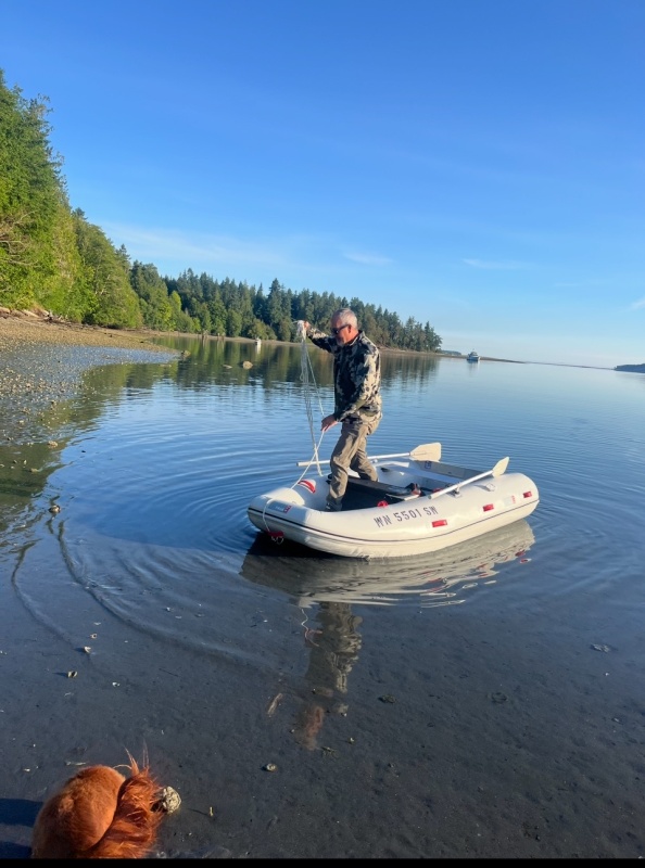 Maiden voyage with our new used dink! Low tide, about 3" of water