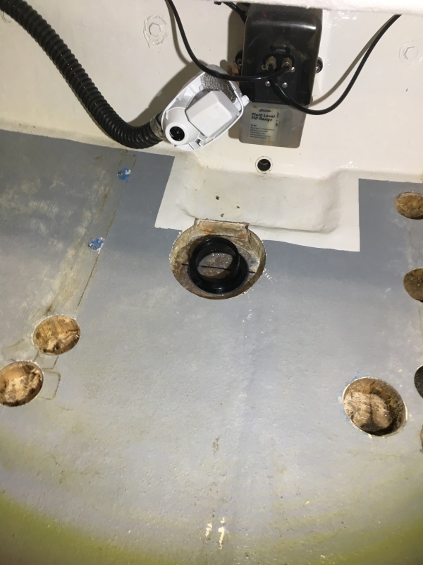 Mounted the transponder base to the bottom of the boat with a thin bead of silicone to hold it in place, fiberglass resin will be poured around it.