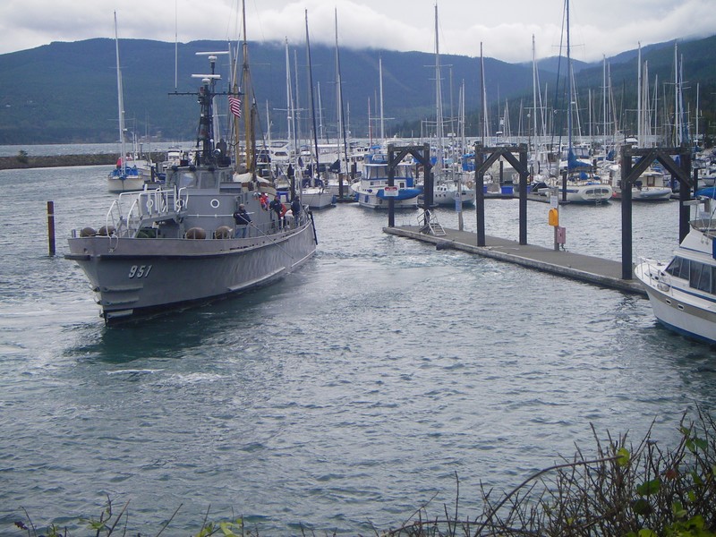 Navy Boat, "Olympic Venture" backing into parking position at John Wayne Marina.
