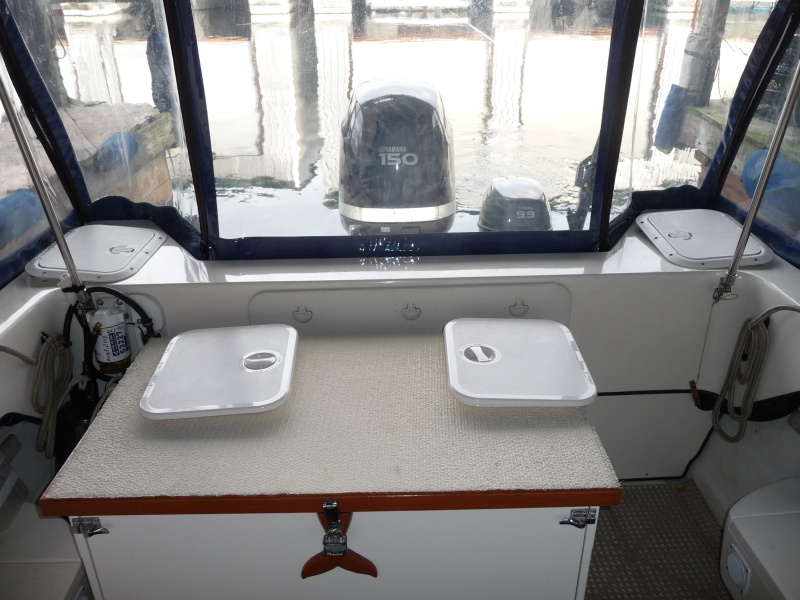 New Covers on cockpit box are:
"Imtra" 4000 Series Rectangular Hatch, Medium, Dream White, Item: SPA-40154
and the original factory covers are in lazerate.