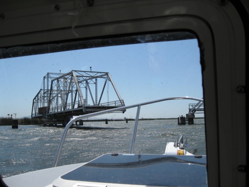 Not much traffic so this bridge is mostly manual. The tender had to walk to both ends and close the gates. Then walk to the shed in the center and operate the motor to open.