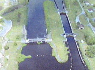 Ortona Lock: Lock chamber:50'x250'- Vertical lift: 7.5' to 8.5'- Discharge capacity 8,600 cfs(cubic feet per second)Operates daily 6:00A to 9:30P-Marine VHF radio Channel 13-Located at Okeechobee Waterway 
statute mile 93.5
