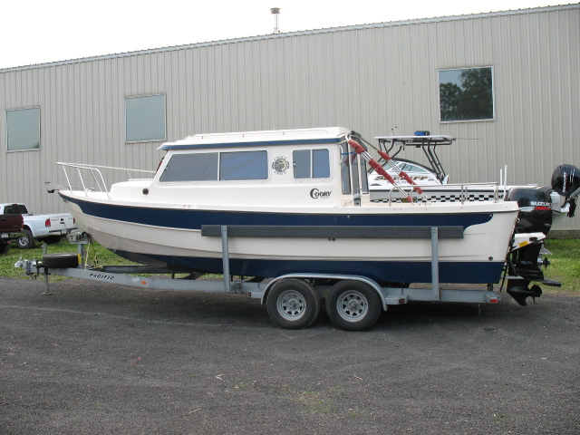 Our boat and trailer rode out on a fifth wheel flatbed trailer, no worse for wear