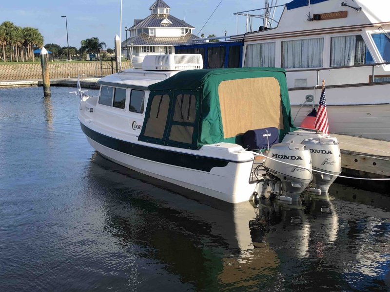 Plastic windows out, added screens, and window curtains.