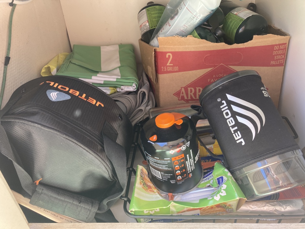 port aft storage under dinette