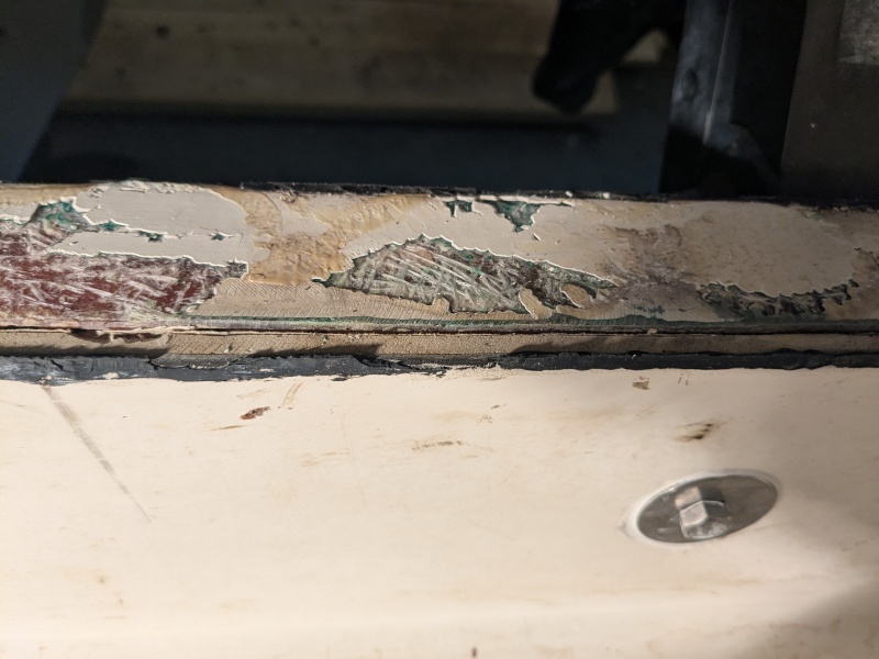 Port side transom, cap removed, below kicker bracket.