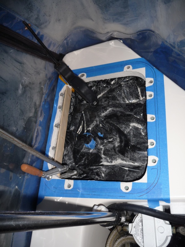 Port temporary wood form clamped in place and ready for thickened  apoxy.