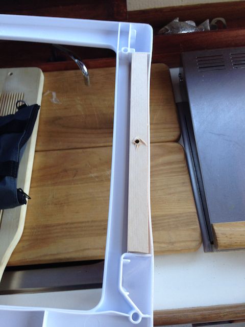 Reinforcing plastic shelves.  Will be mounted from top with standard screw.  Screw will have a piece of wood to hold on to, not just hollow plastic.