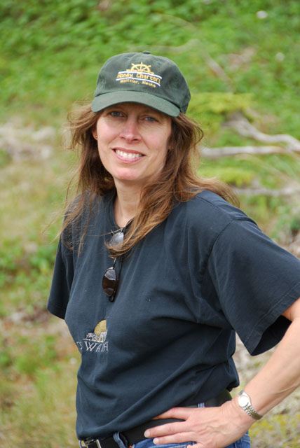 Robin on hike above Day Care Bay.