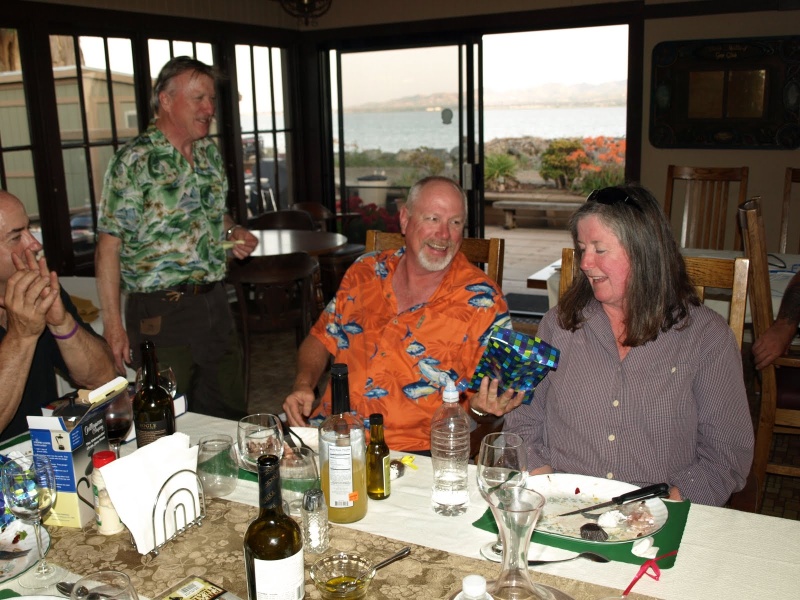 Roger and PJ receive a "seniority" award from Captain Jim.