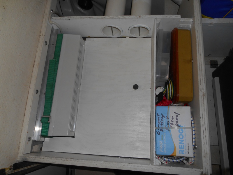 Seat cushion removed to show barrier between lower, air return plenum, and upper, cold air out plenum.