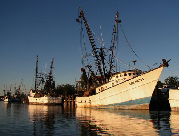Shrimpers at sunset