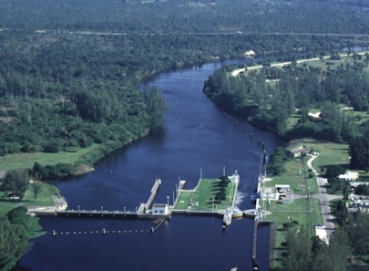 St. Lucie Lock: Lock chamber:50'x250'- Vertical lift:Sea level to current St. Lucie Canal water level 14.5' normal. Operates daily 6:00A to 9:30P-Marine VHF radio Channel 13-Located at Okeechobee Waterway 
statute mile 15.5