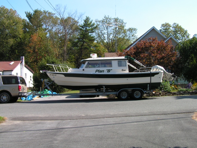 (Stanley-J) After a 19 hour trip home from St. Louis. I had to cut a tree  down to get the boat in the driveway...great planning"