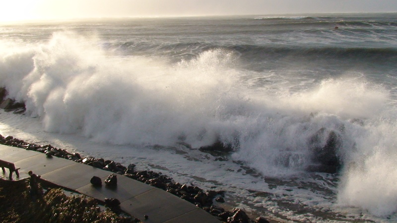 Surf up and over the jetty