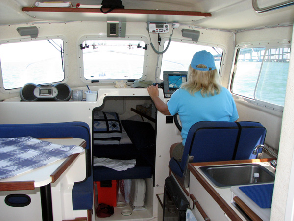 The Blonde at the helm