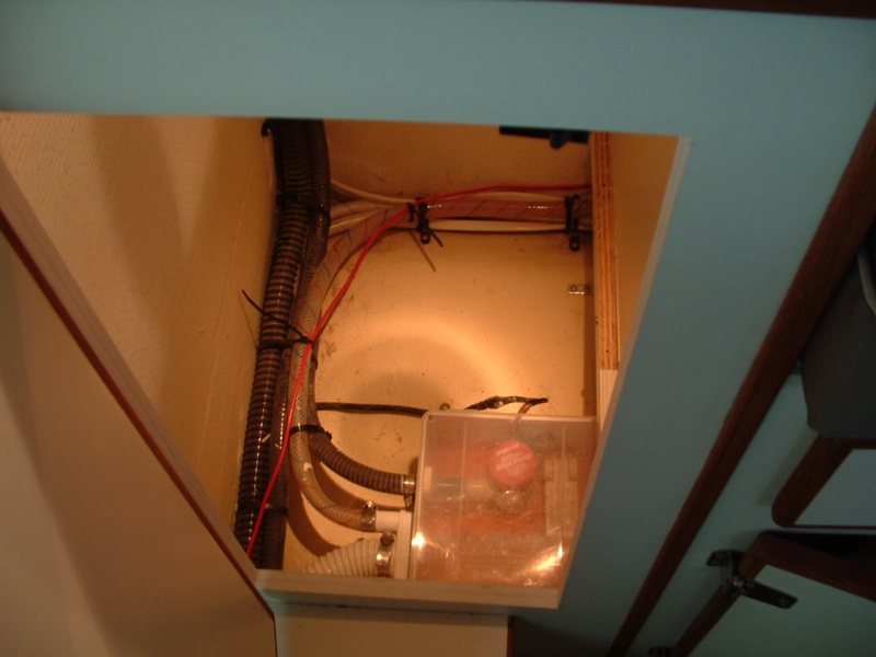 The floor of the locker would have to be lowered 3" and the shower sump moved 1' to the left (from this view).