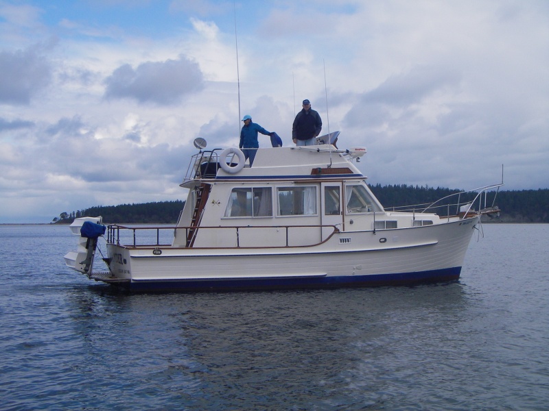 The "Islander" out for a spin. A father daughter team.  Nice boat out of John Wayne.  I believe it is currently for sail-(5-7-11).