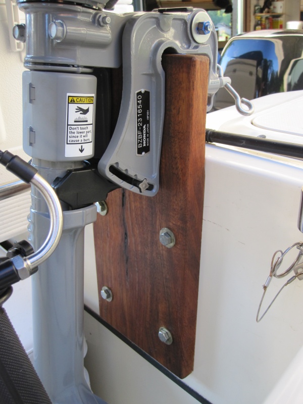 Used a piece of 4 quarter teak. Bolted to port lazarette. These bolts were later replaced with SS carriage bolts.