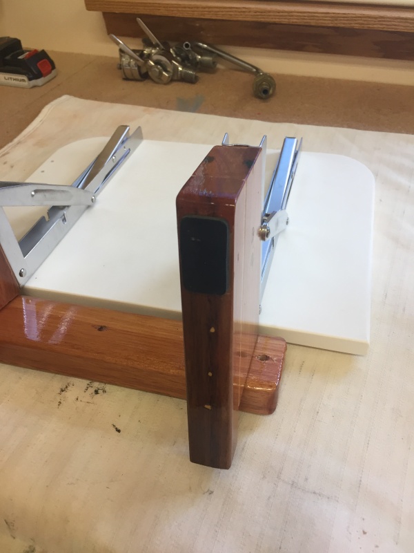 Used Starboard as seat base, rubber patch prevents rubbing against fiberglass hull.