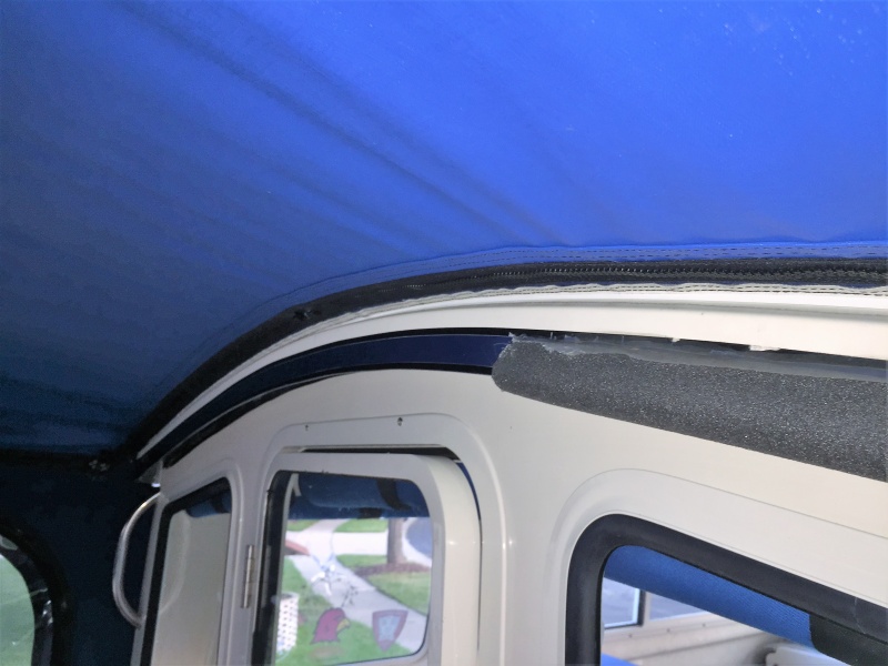 View inside where bimini is attached to roof.