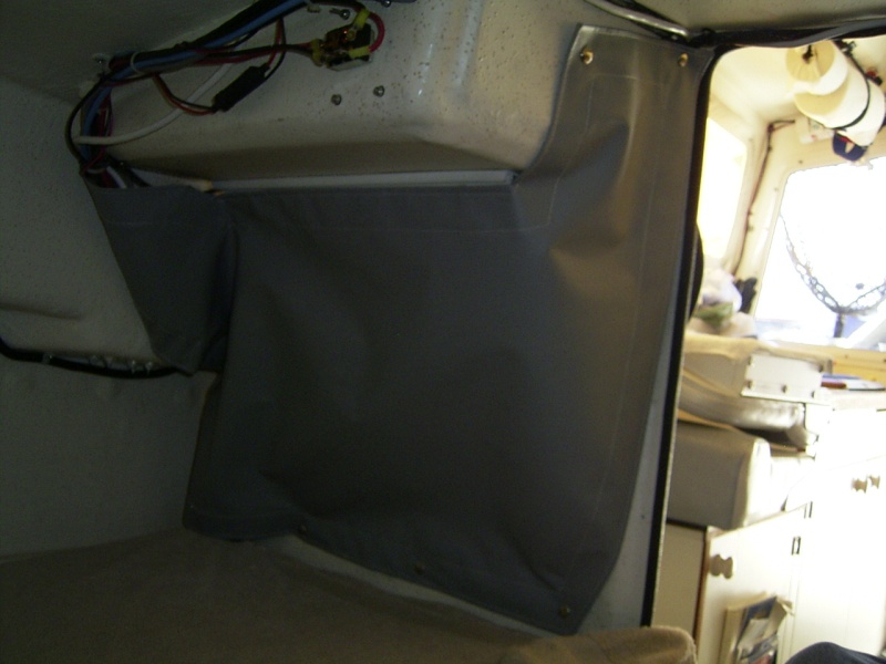 Vinyl cover for the electronics behind the helm. The factory fiberglass cover was a pain to remove and kept coming loose.
